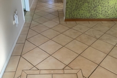 We can replace your aged tiles with a decorative flake floor finish - Before