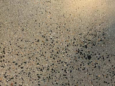 Random Stone Exposure - Polished Concrete